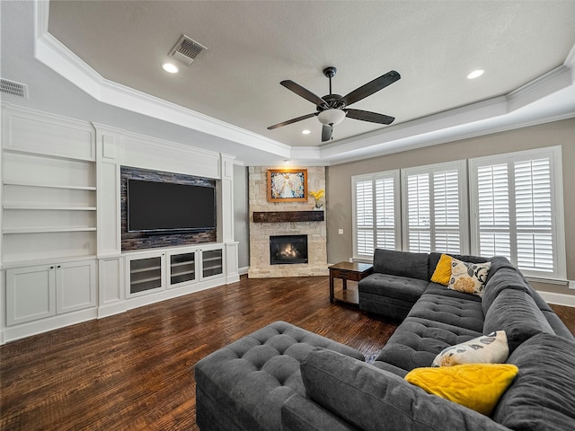 2901 Lakeview Dr, Prosper, TX 75078 - living room with a tray ceiling, ceiling fan, wood finished floors, crown molding, and a fireplace