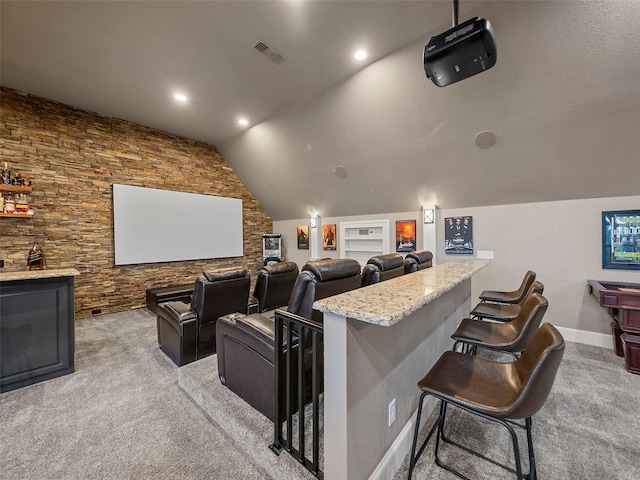 2901 Lakeview Dr, Prosper, TX 75078 - home theater room with vaulted ceiling, light carpet, and baseboards