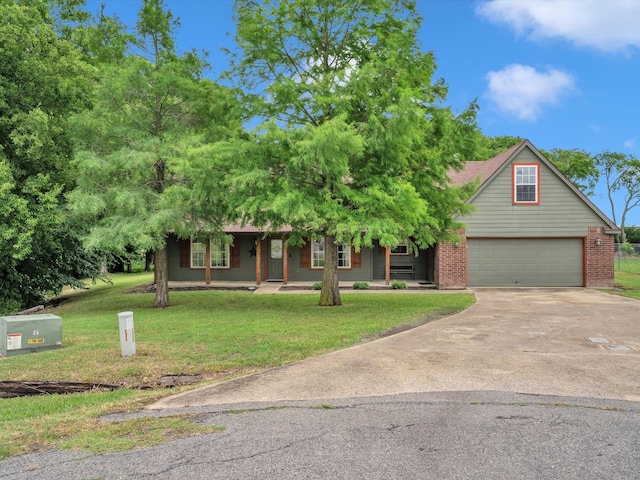 15067 Meadow Ridge Ct, Nevada, TX 75173 - view of front of home featuring driveway, covered porch, a front yard, an attached garage, and brick siding