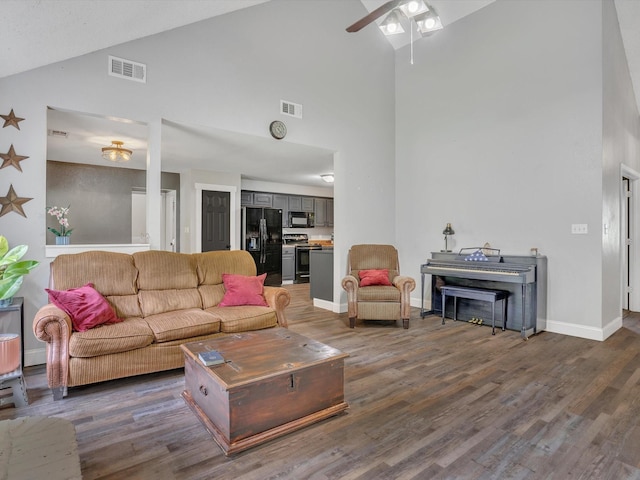 15067 Meadow Ridge Ct, Nevada, TX 75173 - living room featuring high vaulted ceiling, ceiling fan, wood finished floors, and baseboards