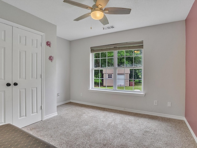 15067 Meadow Ridge Ct, Nevada, TX 75173 - unfurnished bedroom with carpet, baseboards, a closet, and ceiling fan