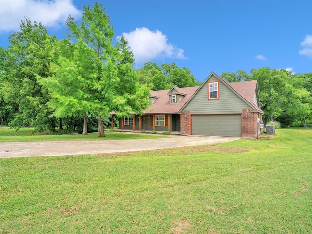 15067 Meadow Ridge Ct, Nevada, TX 75173 - view of front facade featuring concrete driveway, a garage, a front lawn, brick siding, and a porch