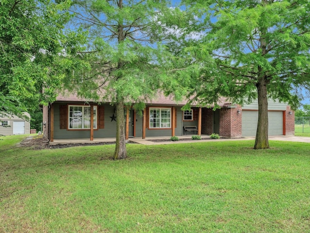 15067 Meadow Ridge Ct, Nevada, TX 75173 - view of front of property featuring a porch, a front yard, concrete driveway, and a garage