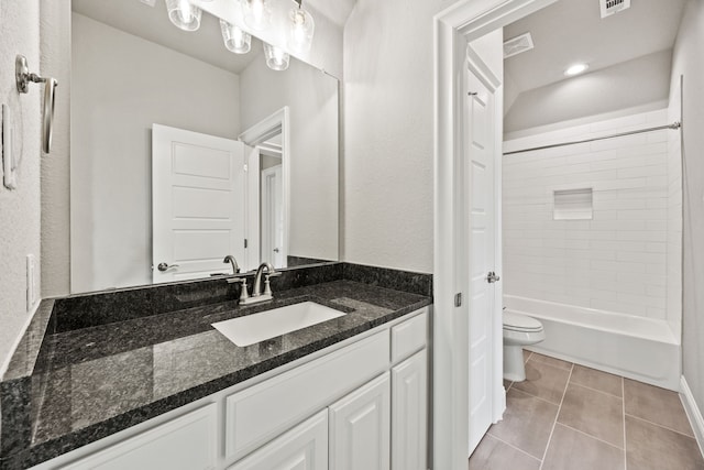 3416 Dovehill Dr, Northlake, TX 76247 - bathroom featuring toilet, vanity, tile patterned floors, and shower / washtub combination