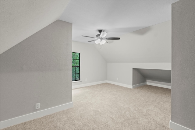 104 W 2nd St, Waxahachie, TX 75165 - bonus room with vaulted ceiling, carpet flooring, a ceiling fan, and baseboards