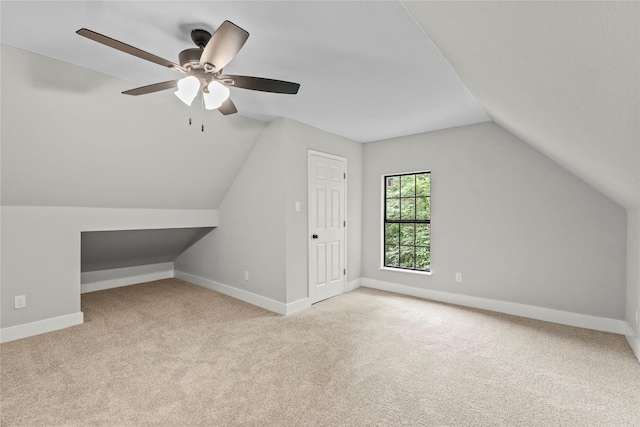 104 W 2nd St, Waxahachie, TX 75165 - additional living space with carpet floors, lofted ceiling, baseboards, and ceiling fan