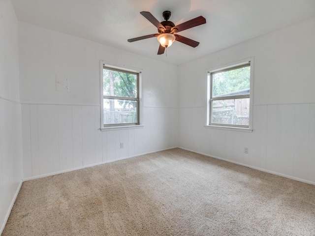 5512 Dennis Ave, Fort Worth, TX 76114 - carpeted spare room with a wainscoted wall and ceiling fan