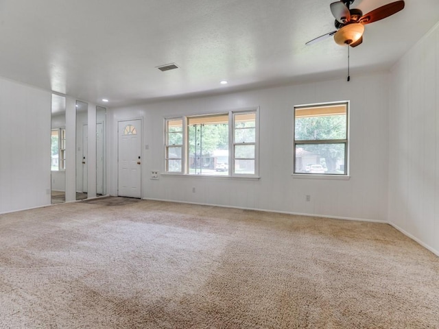 5512 Dennis Ave, Fort Worth, TX 76114 - carpeted empty room with plenty of natural light, ceiling fan, and recessed lighting