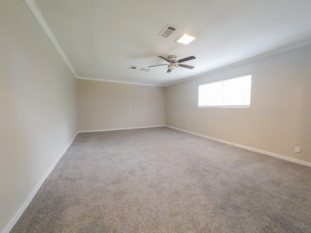 1418 Royal Dr, Kaufman, TX 75142 - carpeted empty room featuring ornamental molding, baseboards, and a ceiling fan