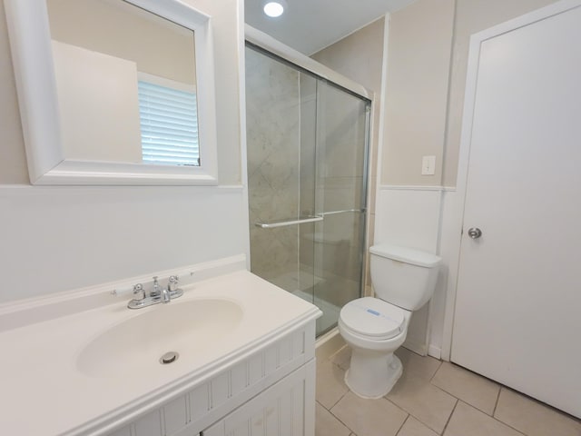 1418 Royal Dr, Kaufman, TX 75142 - full bath featuring toilet, tile patterned flooring, a shower stall, and vanity