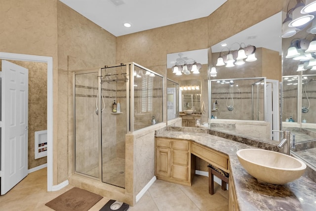 6628 Gray Wolf Dr, Plano, TX 75024 - bathroom with tile patterned flooring, a stall shower, and vanity