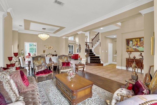 6628 Gray Wolf Dr, Plano, TX 75024 - living room with wood finished floors, ornamental molding, decorative columns, stairway, and baseboards