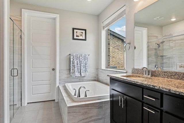 3200 Julian St, Mansfield, TX 76063 - bathroom with vanity, a bath, a shower stall, tile patterned flooring, and recessed lighting