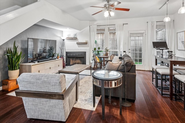 4116 Cole Ave Unit 302, Dallas, TX 75204 - living room featuring a ceiling fan, wood-type flooring, and a fireplace