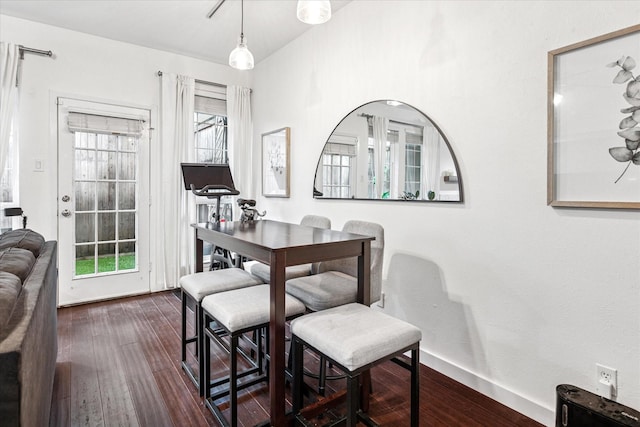 4116 Cole Ave Unit 302, Dallas, TX 75204 - dining area featuring dark wood finished floors and baseboards