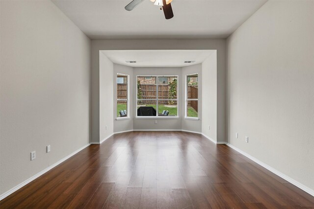 204 Forestview Rd, Hickory Creek, TX 75065 - unfurnished room featuring a ceiling fan, dark wood finished floors, and baseboards