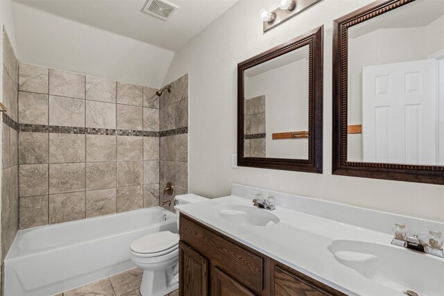 204 Forestview Rd, Hickory Creek, TX 75065 - full bath with double vanity, toilet, vaulted ceiling, and bathing tub / shower combination