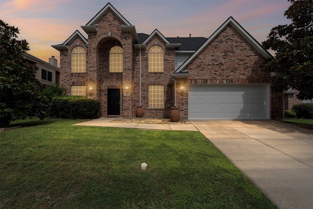 204 Forestview Rd, Hickory Creek, TX 75065 - traditional home featuring concrete driveway, a front lawn, brick siding, and a garage