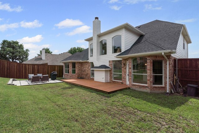 204 Forestview Rd, Hickory Creek, TX 75065 - rear view of house featuring brick siding, a deck, a chimney, roof with shingles, and an outdoor hangout area