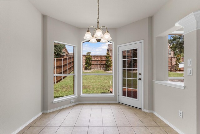 204 Forestview Rd, Hickory Creek, TX 75065 - unfurnished dining area featuring a chandelier, healthy amount of natural light, and tile patterned flooring