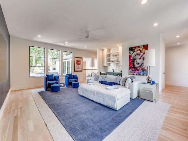 6443 Ellsworth Ave, Dallas, TX 75214 - living area featuring light wood-style floors, baseboards, recessed lighting, and a ceiling fan