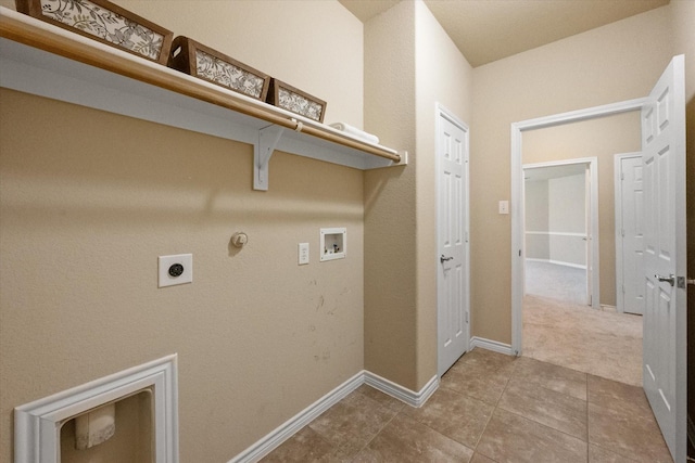304 Adobe Lilly Ct, Mansfield, TX 76063 - laundry area with washer hookup, hookup for an electric dryer, baseboards, tile patterned flooring, and gas dryer hookup