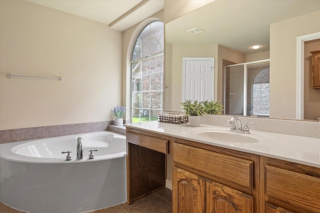 304 Adobe Lilly Ct, Mansfield, TX 76063 - bathroom with vanity, healthy amount of natural light, a stall shower, and a garden tub