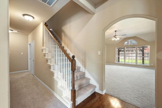 304 Adobe Lilly Ct, Mansfield, TX 76063 - staircase with carpet flooring, ceiling fan, arched walkways, baseboards, and vaulted ceiling