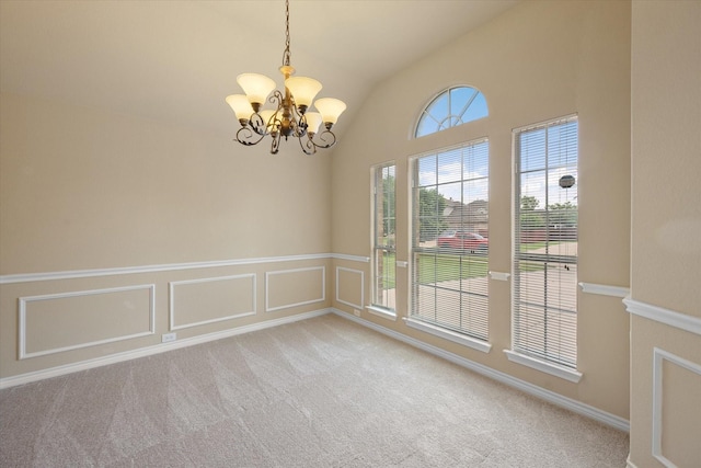 304 Adobe Lilly Ct, Mansfield, TX 76063 - carpeted spare room with lofted ceiling, a chandelier, and a wainscoted wall