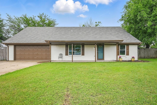 9813 Bancroft Dr, Benbrook, TX 76126 - view of front of property featuring an attached garage, concrete driveway, brick siding, and roof with shingles