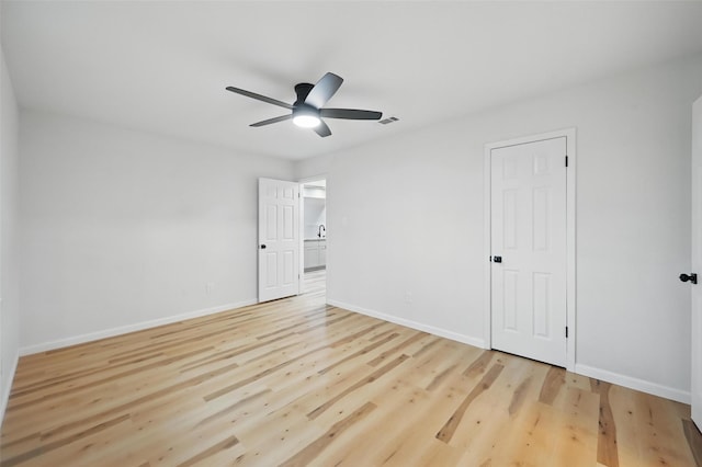 9813 Bancroft Dr, Benbrook, TX 76126 - unfurnished bedroom featuring baseboards, light wood-style flooring, and a ceiling fan