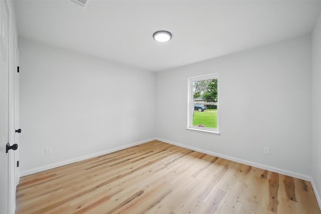 9813 Bancroft Dr, Benbrook, TX 76126 - unfurnished room with baseboards and wood finished floors