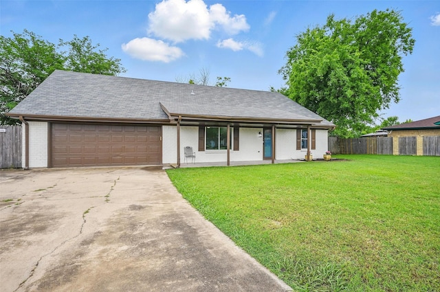 9813 Bancroft Dr, Benbrook, TX 76126 - view of front facade featuring an attached garage, driveway, and brick siding