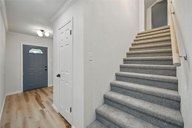 9813 Bancroft Dr, Benbrook, TX 76126 - entryway featuring stairway, wood finished floors, crown molding, and baseboards