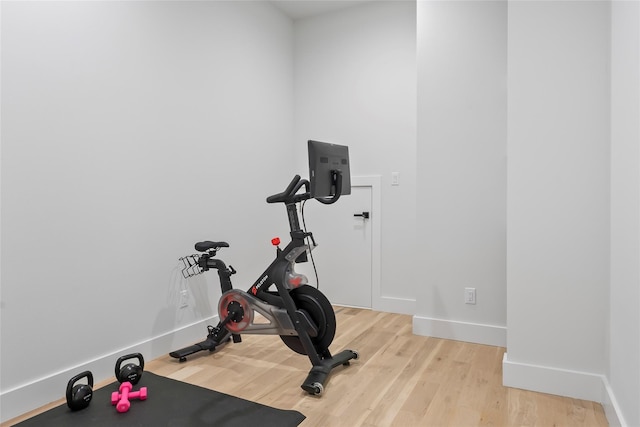 1209 Hicks Trl, Lucas, TX 75002 - workout room featuring light wood-style flooring and baseboards