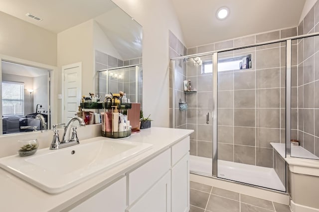 1211 Caddo Hill Ct, Royse City, TX 75189 - full bathroom with vanity, a shower stall, lofted ceiling, tile patterned flooring, and recessed lighting
