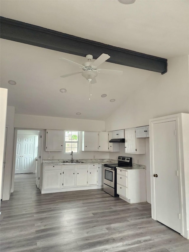 1178 Nob Hill Rd, Quinlan, TX 75474 - kitchen with stainless steel electric stove, a sink, white cabinets, ceiling fan, and beam ceiling