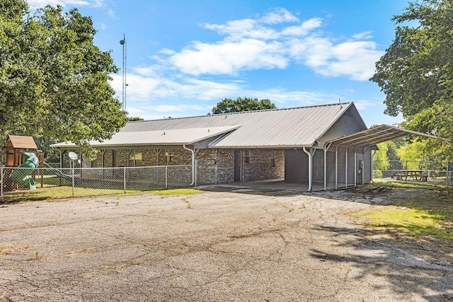 479 Siebman Rd, Sadler, TX 76264 - exterior space with driveway, a carport, and metal roof