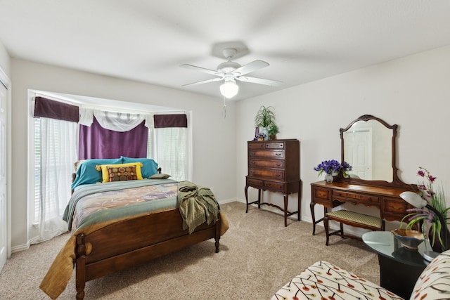 6308 Widgeon Dr, Plano, TX 75024 - bedroom featuring light colored carpet, baseboards, and ceiling fan