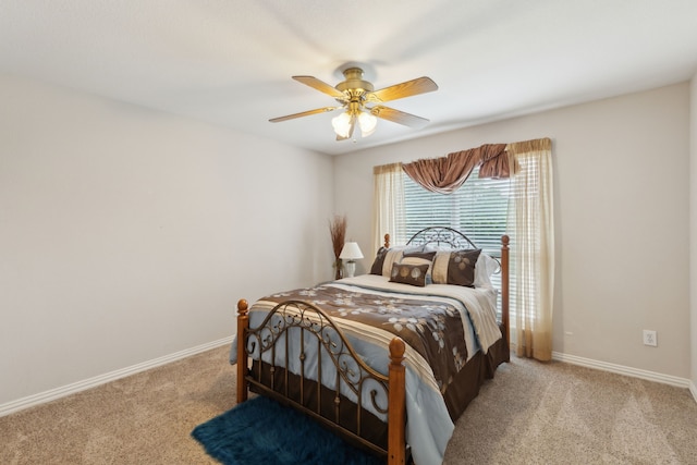 6308 Widgeon Dr, Plano, TX 75024 - bedroom with light carpet, baseboards, and a ceiling fan