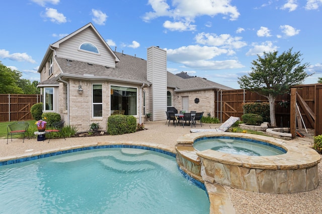 6308 Widgeon Dr, Plano, TX 75024 - view of swimming pool with a patio area, a fenced backyard, and a pool with connected hot tub
