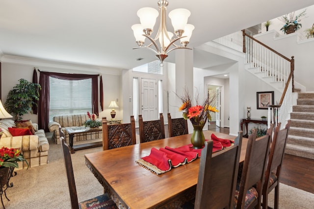 6308 Widgeon Dr, Plano, TX 75024 - dining area with stairway, a chandelier, and wood finished floors