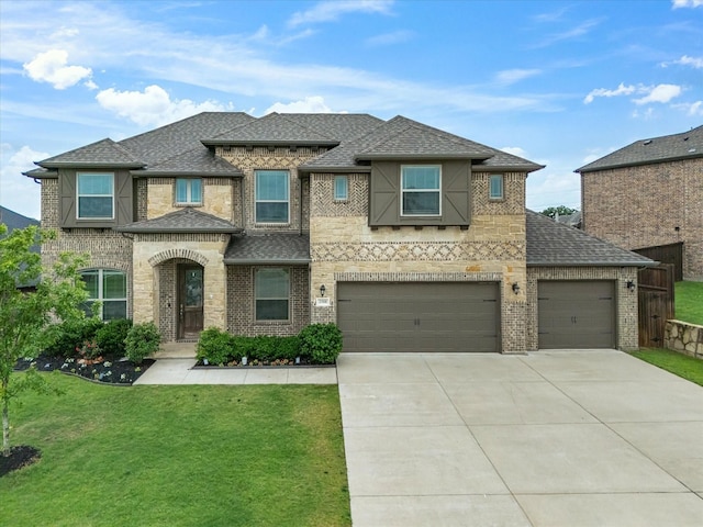 2508 Bunker Hill Dr, Burleson, TX 76028 - view of front of home with concrete driveway, a front yard, brick siding, and roof with shingles