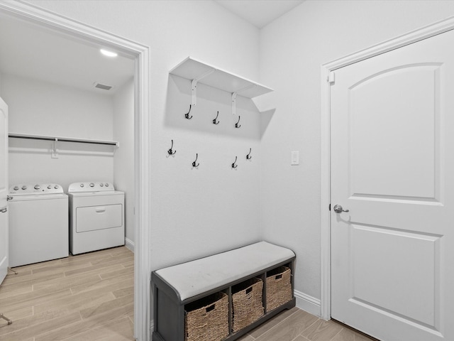 2508 Bunker Hill Dr, Burleson, TX 76028 - mudroom with washing machine and dryer, light wood-style floors, and baseboards