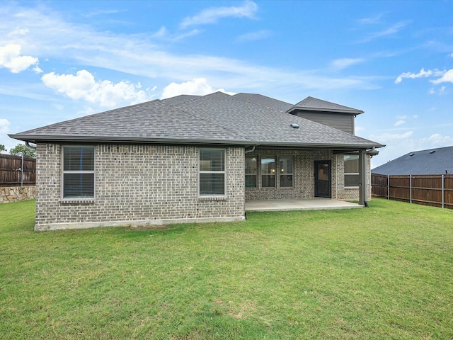 2508 Bunker Hill Dr, Burleson, TX 76028 - rear view of house featuring a shingled roof, a patio, and brick siding