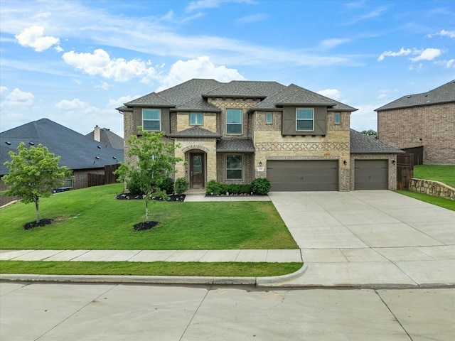 2508 Bunker Hill Dr, Burleson, TX 76028 - view of front of property with concrete driveway, a front lawn, brick siding, a garage, and an attached garage