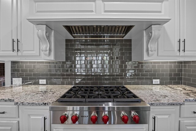 8249 Treemont Pl, Frisco, TX 75034 - kitchen with white cabinetry, tasteful backsplash, and light stone counters