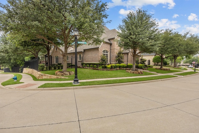 8249 Treemont Pl, Frisco, TX 75034 - view of front of house featuring brick siding