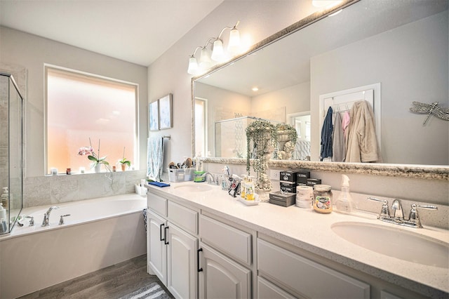 117 Welch Folly Ln, Aledo, TX 76008 - full bath with a shower stall, double vanity, a garden tub, and wood finished floors
