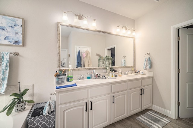 117 Welch Folly Ln, Aledo, TX 76008 - bathroom featuring double vanity and wood finished floors
